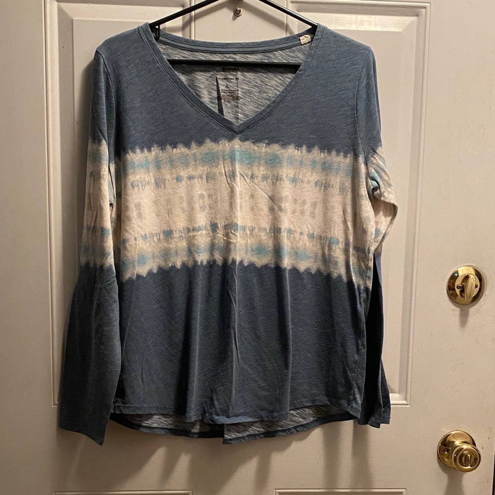 Elegant Blue and White V-Neck Blouse